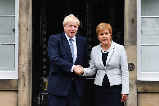 Nicola Sturgeon welcomes Boris Johnson to Bute House in Edinburgh during a previous visit in 2019 (Photo by Jeff J Mitchell/Getty Images)