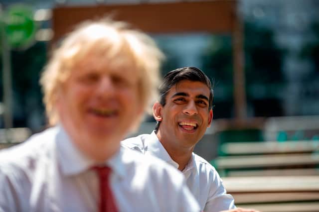 Boris Johnson and Rishi Sunak (Photo by HEATHCLIFF O'MALLEY/POOL/AFP via Getty Images)