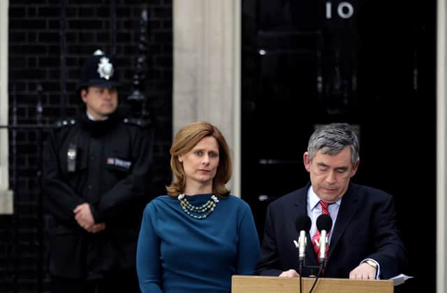 Gordon Brown and his wife Sarah on the steps of Downing Street as he resigns on May 11, 2010 (Photo by Dan Kitwood/Getty Images)