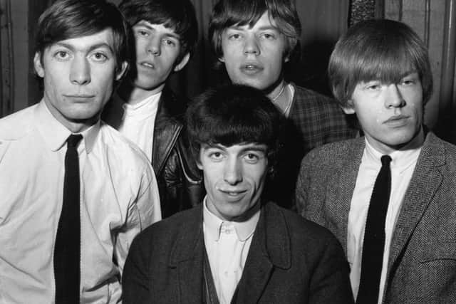 1963:  The early line-up of The Rolling Stones, from left to right; Charlie Watts, Keith Richards, Bill Wyman (front), Mick Jagger and Brian Jones (1942 - 1969).  (Photo by Chris Ware/Keystone Features/Getty Images)