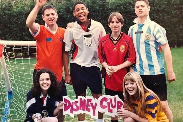 Ballard (third from back left) was associated with GMTV’s ‘Disney Club’ which was also presented by Reggie Yates (second from back left) (Photo: ITV)