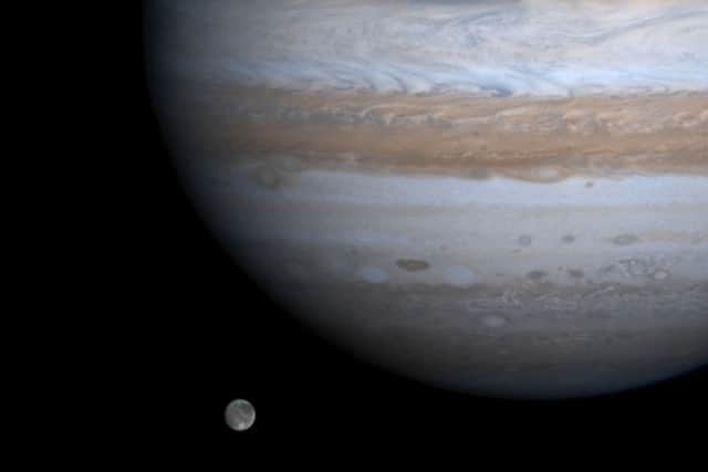 To those with telescopes, the Galilean moons (including Ganymede, pictured here) will look like ‘pinpricks of light’ in orbit around Jupiter (Photo: NASA/Newsmakers)
