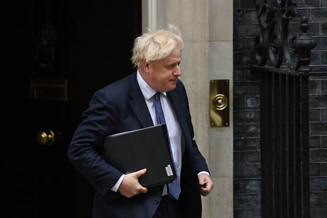 Boris Johnson leaves Downing Street in central London on August 18, 2021 ahead of an extraordinary session of parliament to discuss the collapse of the Afghan government (Glyn Kirk/AFP/Getty)