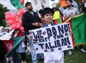 Protesters gather on Parliament Square against the Taliban take over of Afghanistan on August 18 after House of Commons Speaker, Sir Lindsay Hoyle, recalled parliament from its summer recess to debate the situation (Dan Kitwood/Getty)