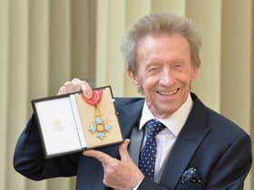 Former Scotland and Manchester United footballer Denis Law poses with his Commander of the Order of the British Empire (CBE) medal that was presented to him by the Duke of Cambridge during an Investiture ceremony at Buckingham Palace on March 11, 2016 in London, United Kingdom. (Pic: Getty)