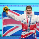 Great Britain’s Duncan Scott, pictured picking up his silver medal for the Men’s 200m Individual Medley Final at the Tokyo 2020 Olympic Games in Japan. Photo: PA