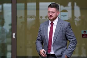 Tommy Robinson outside Westminster Magistrates’ Court, London, where he is accused of stalking journalist Lizzie Dearden (Photo: PA)