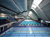 The main swimming pool hall of the Manchester Aquatics Centre (Photo by OLI SCARFF/AFP via Getty Images)