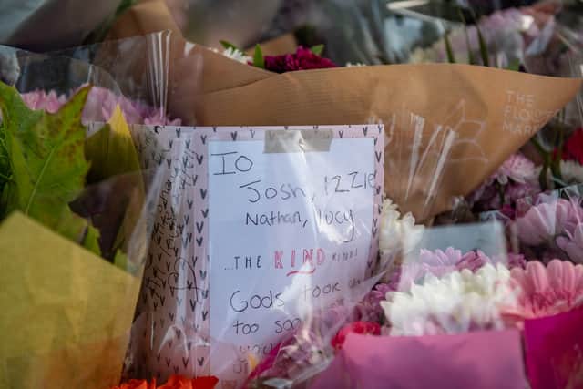 Tributes were left at the scene on Bromley lane, Kingswinford on October 15 2020 (image: SWNS)