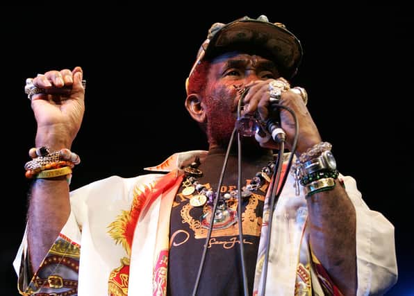 Lee 'Scratch' Perry performs on stage at the West Coast Blues & Roots Festival at the Esplanade Reserve, Fremantle on March 31, 2007 in Perth, Australia.  (Photo by Paul Kane/Getty Images)