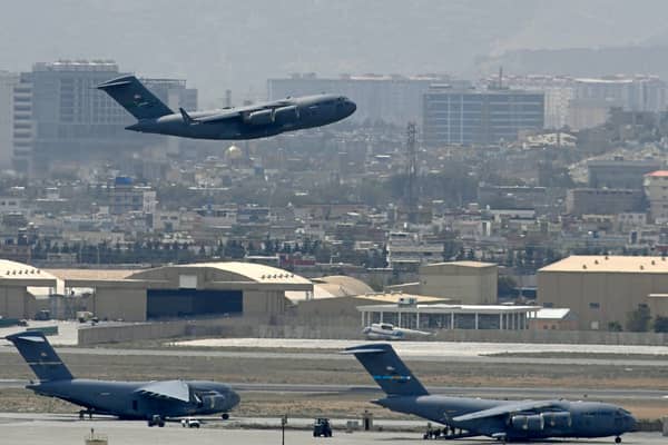 A US Air Force aircraft takes off from the airport in Kabul on August 30, 2021 (Photo by AAMIR QURESHI/AFP via Getty Images)
