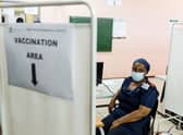 A nurse awaits to receive a dose of a vaccine against Covid-19 in South Africa as the country proceeds with its inoculation campaign (Photo: MLUNGISI MBELE/AFP via Getty Images)