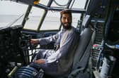 A Taliban fighter sits in the cockpit of an Afghan Air Force aircraft at the airport in Kabul (Photo: WAKIL KOHSAR/AFP via Getty Images)