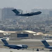 A US Air Force aircraft takes off from the airport in Kabul on August 30 as rockets were fired at the airport where US troops were racing to complete their withdrawal (Aamir Qureshi / AFP/Getty)