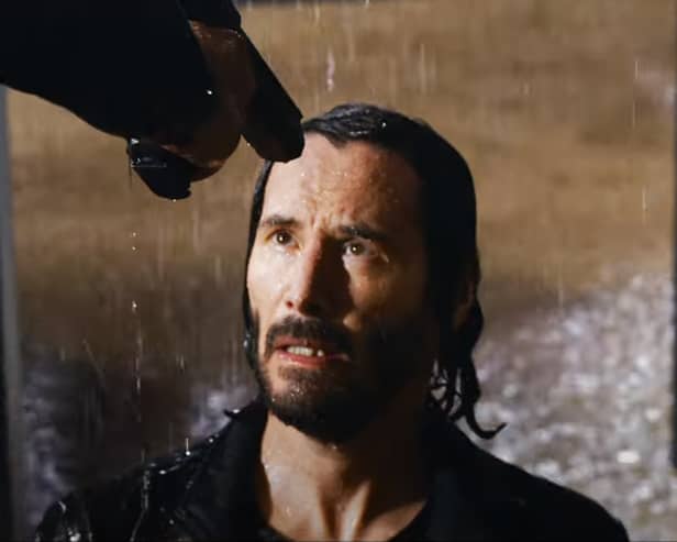 Keanu Reeves in the new Matrix Resurrection trailer (Photo: Warner Bros)