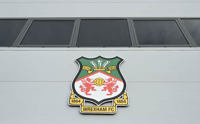<p>Wrexham badge on their Racecourse Ground Stadium. (Picture: Getty Images)</p>