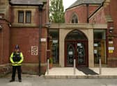 Police officers stand on duty outside a Didsbury Mosque in Didsbury, Manchester (Getty Images)