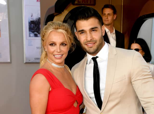 Britney Spears (L) and Sam Asghari arrive at the premiere of Sony Pictures’ “One Upon A Time...In Hollywood” at the Chinese Theatre on July 22, 2019 in Hollywood, California  (Photo by Kevin Winter/Getty Images)
