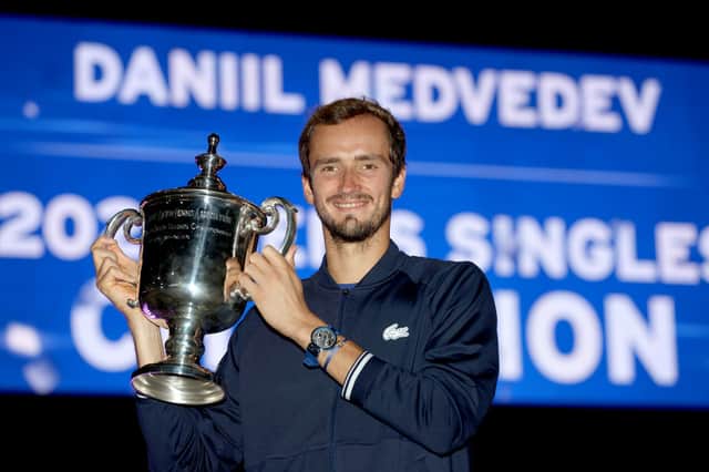 Daniil Medvedev celebrates with the championship trophy after defeating Novak Djokovic to win the Men’s Singles final match (Photo: Matthew Stockman/Getty Images)