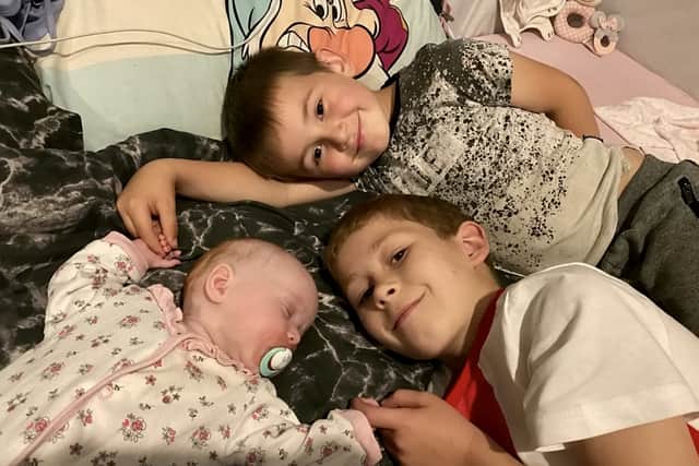 Daughter Aida-May pictured with her big brothers Hayden and Leo was born healthy and happy eight weeks early via a c-section (image: SWNS/Kathleen Osbourne)