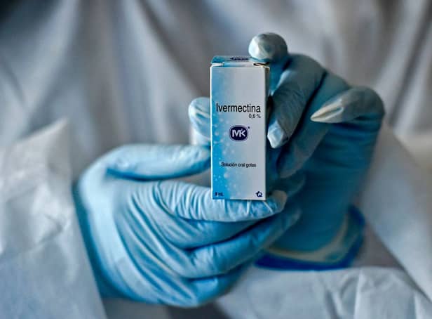 <p>A health worker shows a box containing a bottle of Ivermectin, a medicine authorised for use against Covid-19 in many South American countries, although not yet approved by the UK or US (Photo: LUIS ROBAYO/AFP via Getty Images)</p>