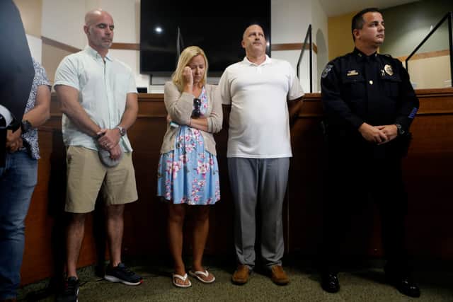 Gabby Petito’s father Joe Petito looks on with her stepmother Tara while the City of North Port Chief of Police Todd Garrison speaks during a news conference while the 22-year-old was missing. (Photo: Octavio Jones/Getty Images)