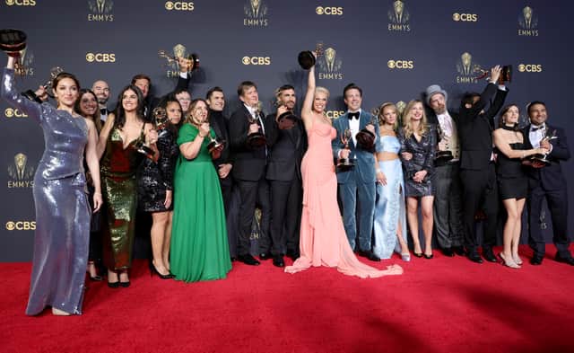 <p>Cast and crew such as Leann Bowen, Jeff Ingold , Tina Pawlik, Jeremy Swift, Phil Dunster , Bill Lawrence, Brett Goldstein, Hannah Waddingham, Jason Sudeikis, Juno Temple, Brendan Hunt, Bill Wrubel, Phoebe Walsh, and Nick Mohammed, accept the award for best comedy for Ted Lasso</p>