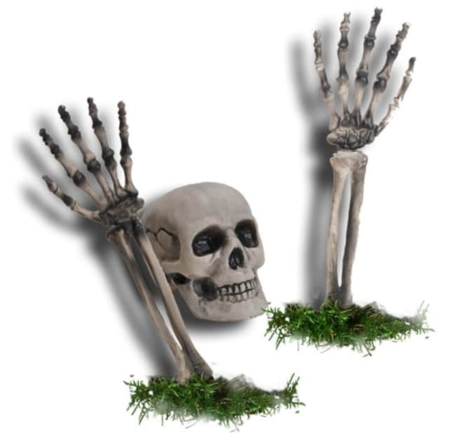 <p>Tesco Buried Alive Skeleton Lawn Decoration</p>