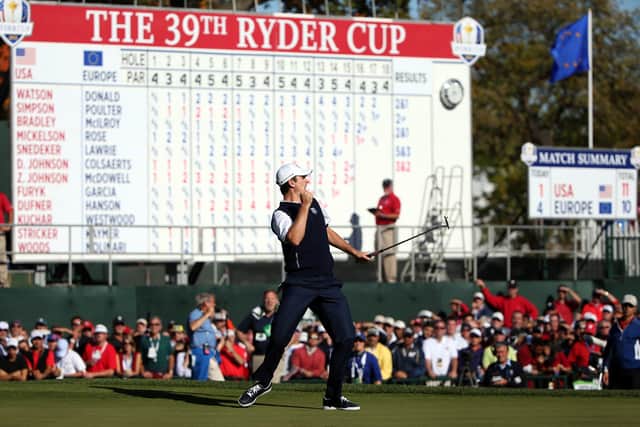  Justin Rose of Europe celebrates a birdie putt on the 18th green to defeat Phil Mickelson 1up during the Singles Matches for The 39th Ryder Cup at Medinah Country Club