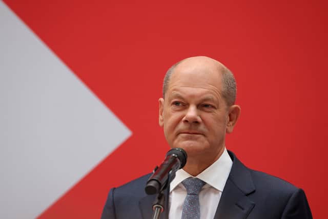Olaf Scholz speaking at SPD party headquarters following the narrow victory over the CDU/CSU.