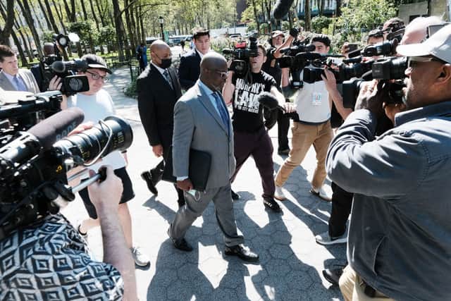 Lawyers for R. Kelly walk out of a Brooklyn courthouse as jury deliberations continued in the federal trial against the performer (Picture: Getty Images)
