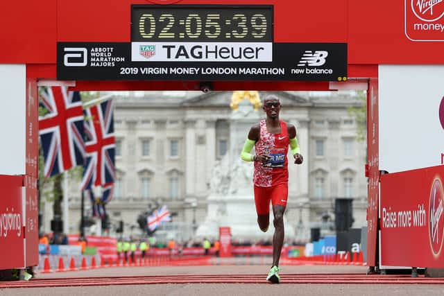 Mo Farah competing in the London Marathon 2019. This year roughly 100,000 will compete in the race around the world.