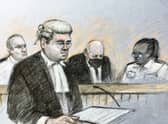 Court artist sketch of prosecutor Tom Little QC speaking as former Metropolitan Police officer Wayne Couzens, 48, sits in the dock at the Old Bailey in London, on the first day of a two-day sentence hearing (PA/Elizabeth Cook)