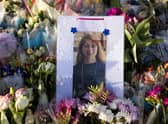 Flowers surround the Clapham Common bandstand memorial to murdered Sarah Everard on March 27, 2021 (Photo by Dan Kitwood/Getty Images)
