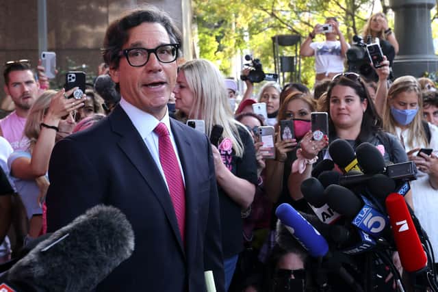 Britney Spears’ attorney Mathew Rosengart speaks to the press and #FreeBritney activists after a hearing in which Spears’ father, Jamie Spears, was removed by a judge as conservator of her estate (image: Kevin Winter/Getty Images)