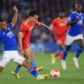 Hirving Lozano of SSC Napoli is challenged by Ryan Bertrand of Leicester City during the UEFA Europa League group C match between Leicester City and SSC Napoli at The King Power Stadium on September
