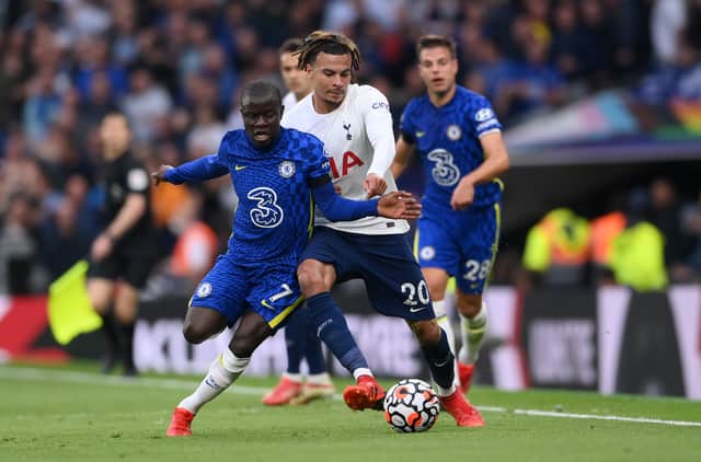 Ngolo Kante of Chelsea and Dele Alli of Tottenham Hotspur battle (Photo by Laurence Griffiths/Getty Images)