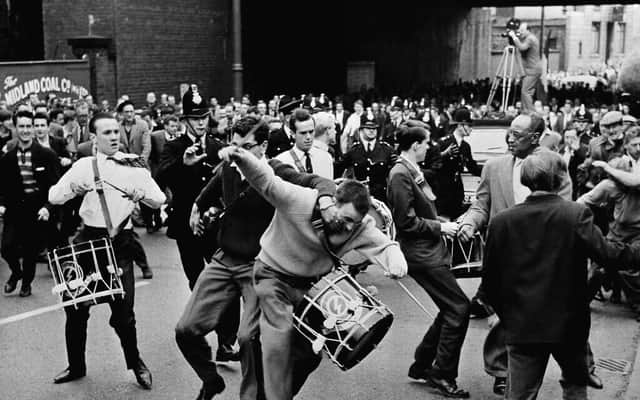A riot breaks out between Group 62 and the extremist right-wing British union movement, during a march through Manchester, England on July 29, 1962
