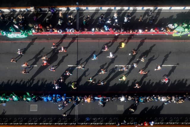 Runners crossing Tower Bridge on Sunday’s London Marathon. 