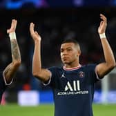 Neymar and Kylian Mbappe of Paris Saint-Germain acknowledge the fans following victory in the UEFA Champions League group A match between Paris Saint-Germain and Manchester City 