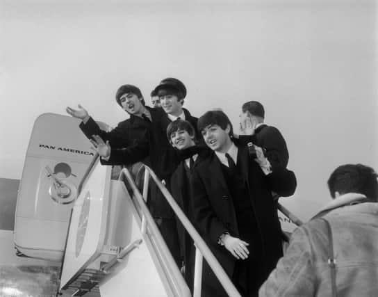 The Beatles pictured in 1964 (Photo by J. Wilds/Keystone/Getty Images)