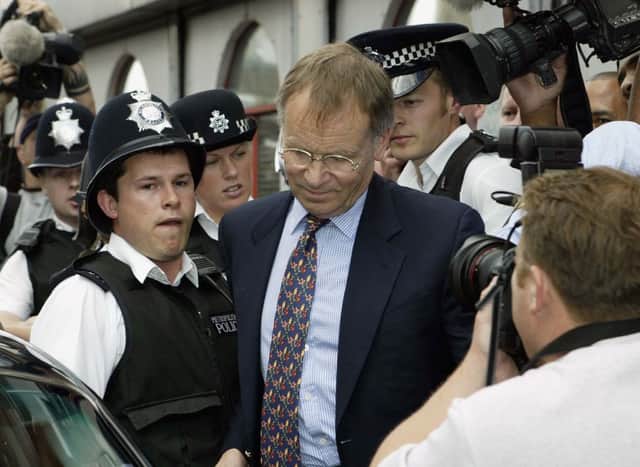 Jeffery Archer leaving Stockwell Police Station July 21, 2003 in South London after visiting his probation officer (Photo: Cattermole/Smith/Getty Images)