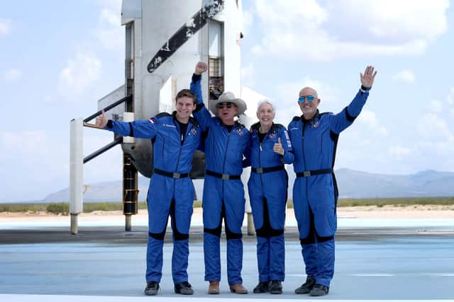 Blue Origins New Shepard crew Oliver Daemen, Jeff Bezos, Wally Funk, and Mark Bezos pose for a picture after flying into space (Photo: Joe Raedle/Getty Images)