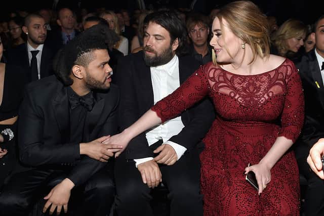 Adele, Simon Konecki and singer The Weeknd at the 58th GRAMMY Awards (Photo: Larry Busacca/Getty Images for NARAS)