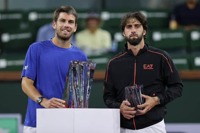 Norrie, right, stands with runner-up Nikoloz Basilashvili