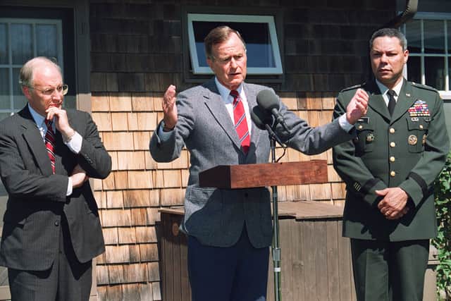 He served as Chairman of the Joint Chief of Staff, pictured here with President George Bush and Defense Secretary Dick Cheney in 1990.