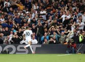 Leeds United fans celebrate their sides first goal scored by Raphinha of Leeds United   during the Premier League match between Leeds United and West Ham United at Elland Road on September 25, 2021