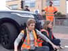 Shocking footage shows furious mum in Range Rover drive into Insulate Britain protesters blocking the road