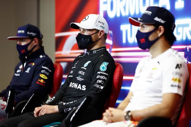 Bottas (centre) Verstappen (left) and Perez (right) after coming 1st, 2nd and 3rd respectively in Turkey