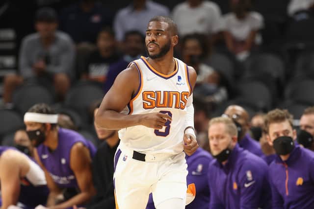 Chris Paul playing for his current team the Phoenix Suns